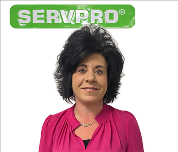 Christy, Female, SERVPRO employee, pink shirt, green sign