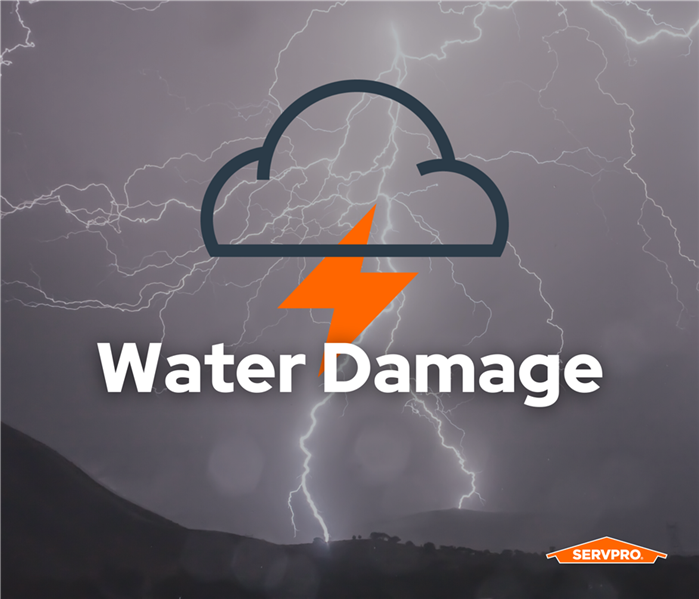 lightning, dark, gray, storm clouds, SERVPRO storm logo with the words water damage on top